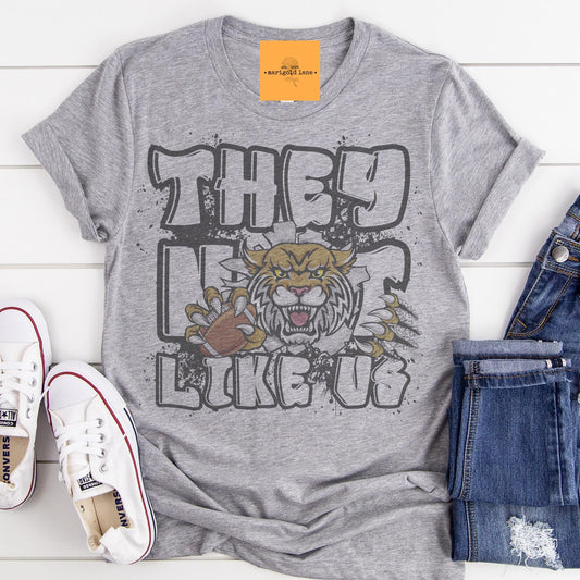 Bobcats they not like us game day mascot, football tshirt, football mom tshirt, cute game day tshirt, mascot tshirt, unisex cut tshirt