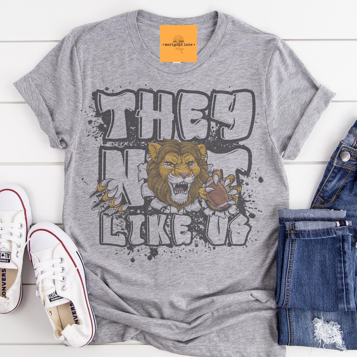 Lions they not like us game day mascot, football tshirt, football mom tshirt, cute game day tshirt, mascot tshirt, unisex cut tshirt
