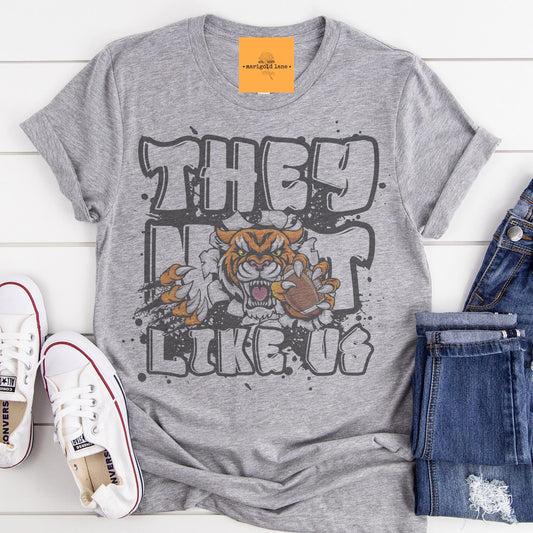 Tigers they not like us game day mascot, football tshirt, football mom tshirt, cute game day tshirt, mascot tshirt, unisex cut tshirt