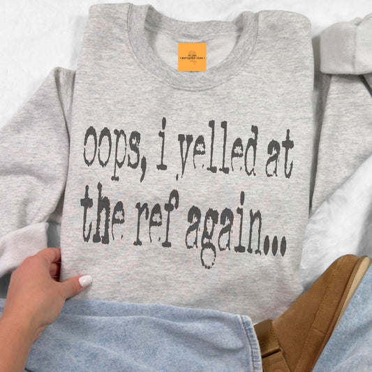 Oops I yelled at the ref again , Varsity game day football, football mom crewneck, cute game day sweatshirt, Heather ash unisex sweatshirt